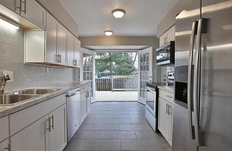Remodeled kitchen with view of deck